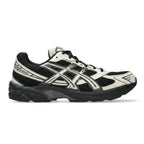 A black and off-white ASICS running shoe shown from the side against a plain white background.