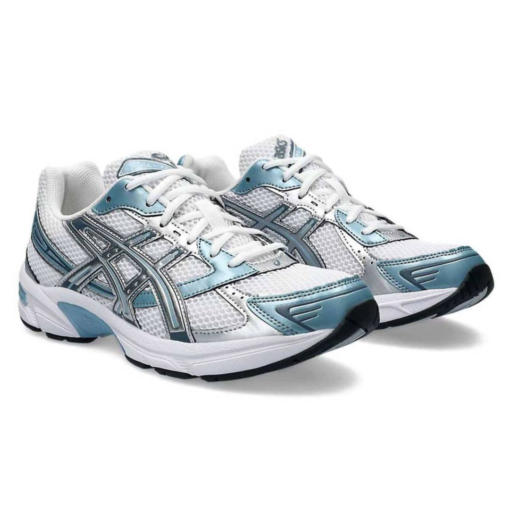 Asics pair of white and blue running shoes on a white background