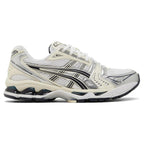 Asics gel kayano 14 White and black athletic shoe on a white background