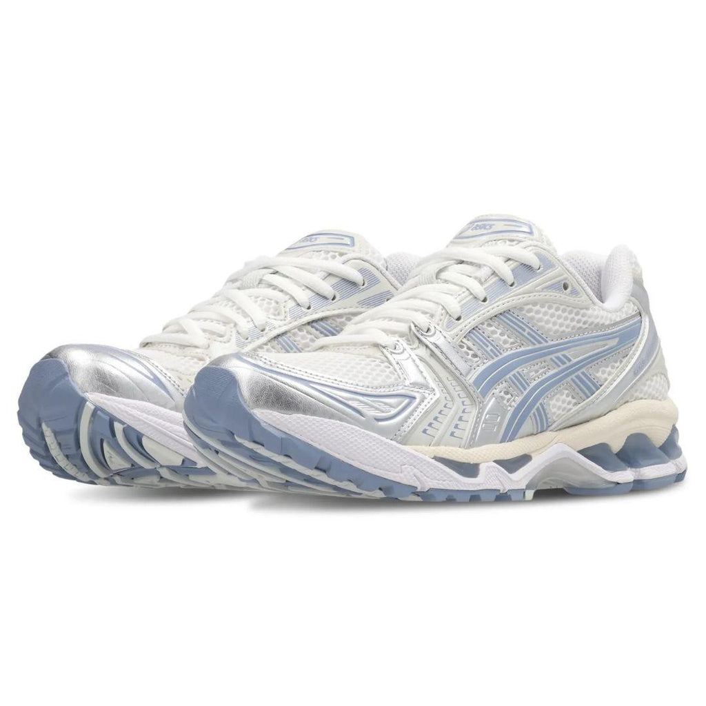 A pair of white and light blue athletic sneakers with silver metallic accents, shown from a three-quarters angle on a white background.