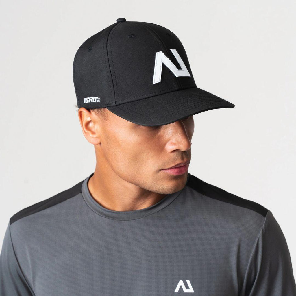 Agaru 'Carbon Black' SRG Cap for men, front view on model of black structured baseball cap with raised Agaru logo badge and SRG side print on the curved brim