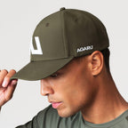 Agaru 'Deep Olive' SRG Cap for men, side view on model showing the Agaru wordmark on the side panel and structured cotton crown of the olive cap