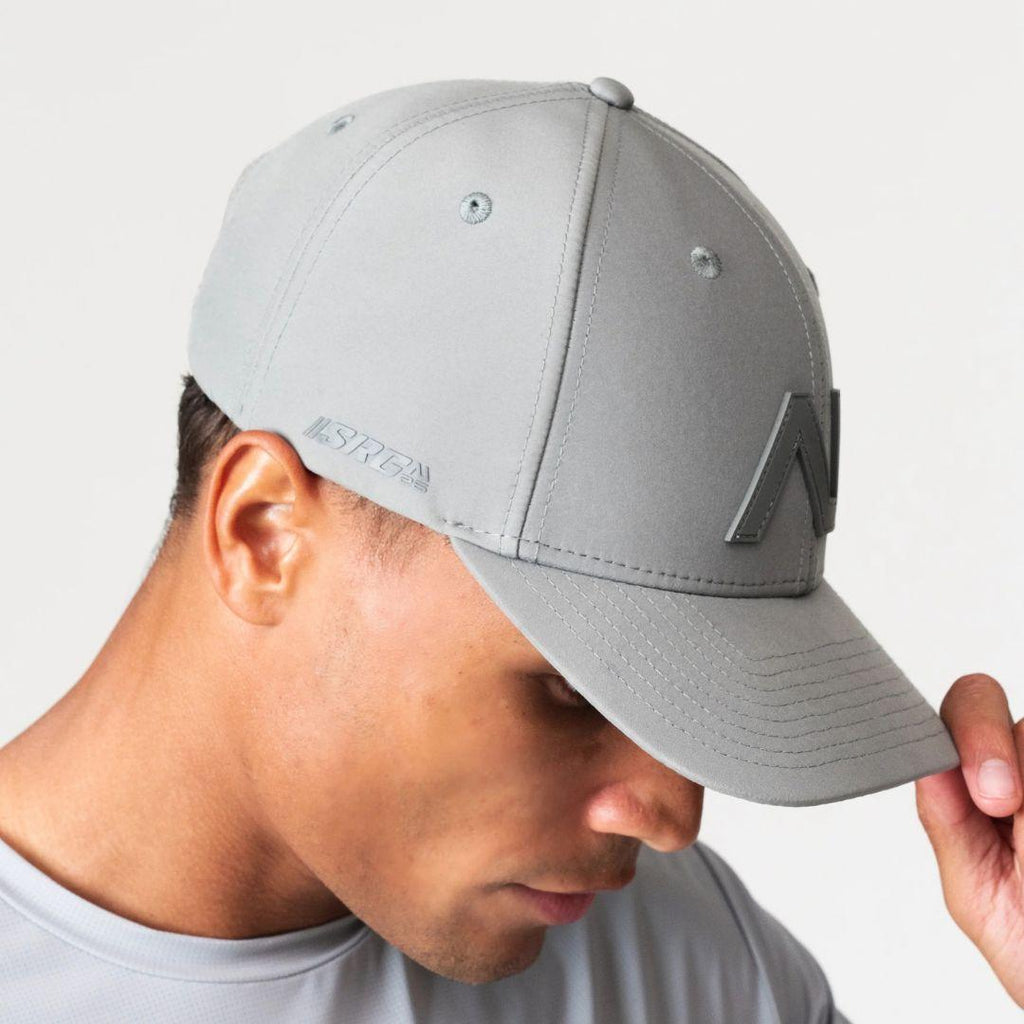 Agaru 'Titanium Grey' SRG Cap for men, close-up side view on model showing the SRG side print and structured cotton crown of the grey cap