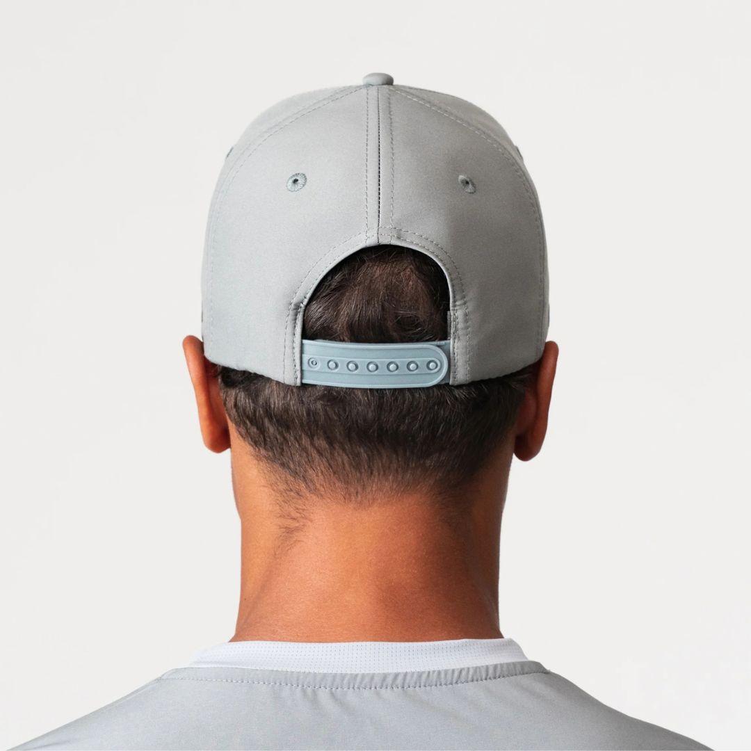 Agaru 'Titanium Grey' SRG Cap for men, back view on model showing the adjustable snap clasp closure on the grey structured cap