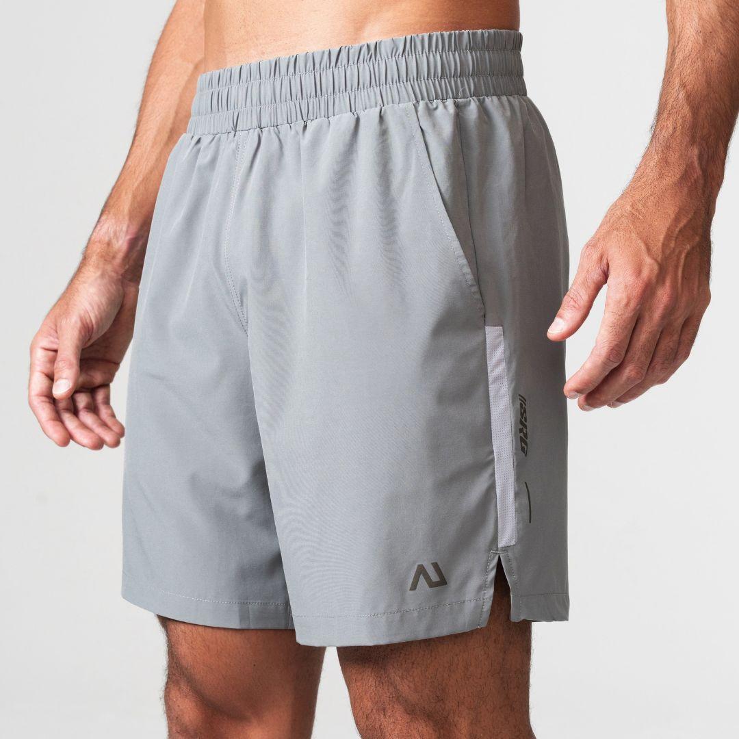 Agaru 'Titanium Grey' SRG Shorts for men, front view on model of grey woven training shorts with elasticated waistband, side pockets and SRG branding