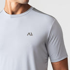 Agaru 'Titanium Grey' SRG T-Shirt for men, close-up of grey seamless knit fabric with panelled shoulder detail and Agaru logo on the chest