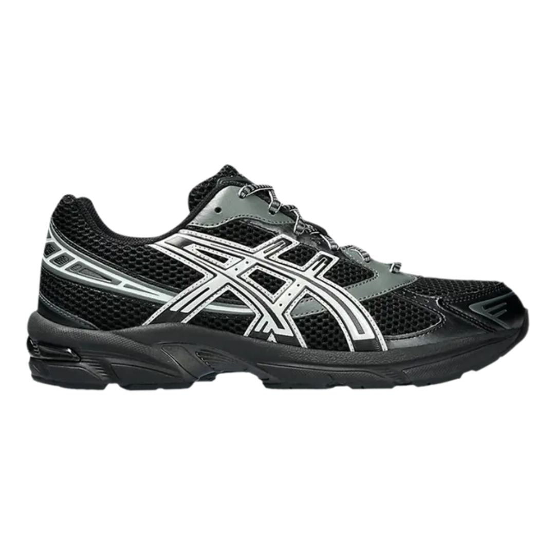 Asics black and grey running shoe on a light gray background