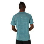 A man viewed from behind wearing a heathered teal athletic t-shirt with a textured back panel and a small white circular logo, set against a plain white background.