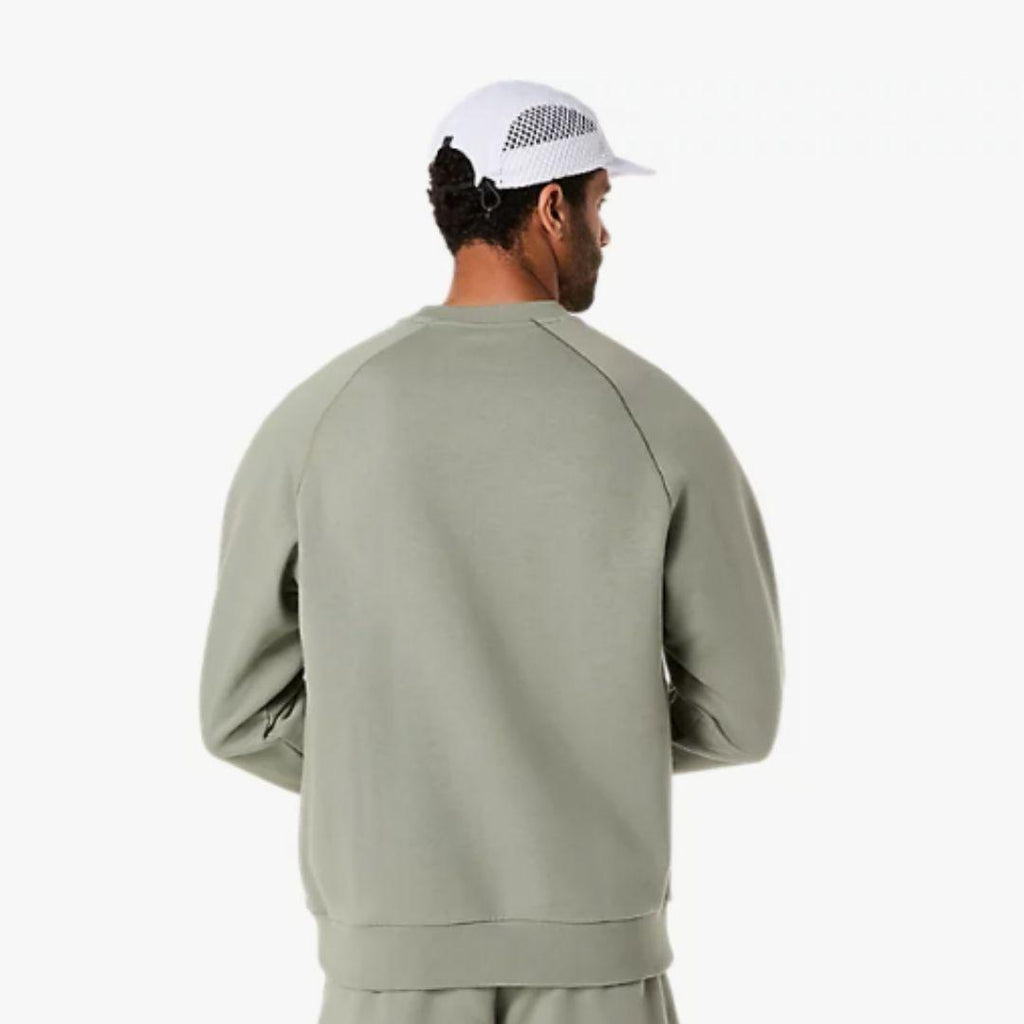 Asics 'Light Green' Sweatshirt for men, back view on model showing the relaxed fit and plain crew neck of the light green fleece sweatshirt
