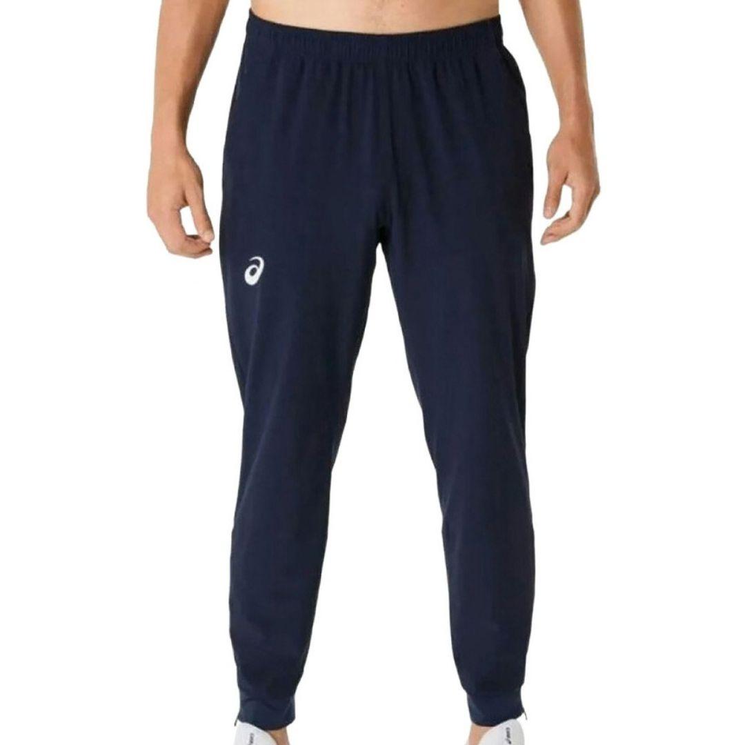 Asics Navy Core Woven Pant for men, front view on model of navy training trouser with elasticated waistband and Asics logo