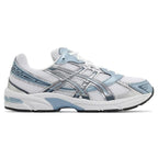 White and blue Asics running shoe on a white background