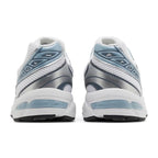 White and blue athletic shoes on a white background