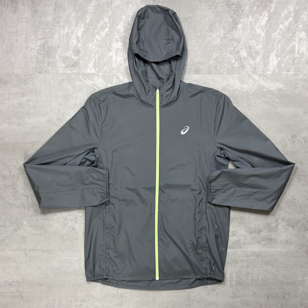 Asics Grey hooded jacket with a zipper on a textured gray background