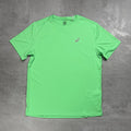 Green t-shirt with a Asics logo on a gray background