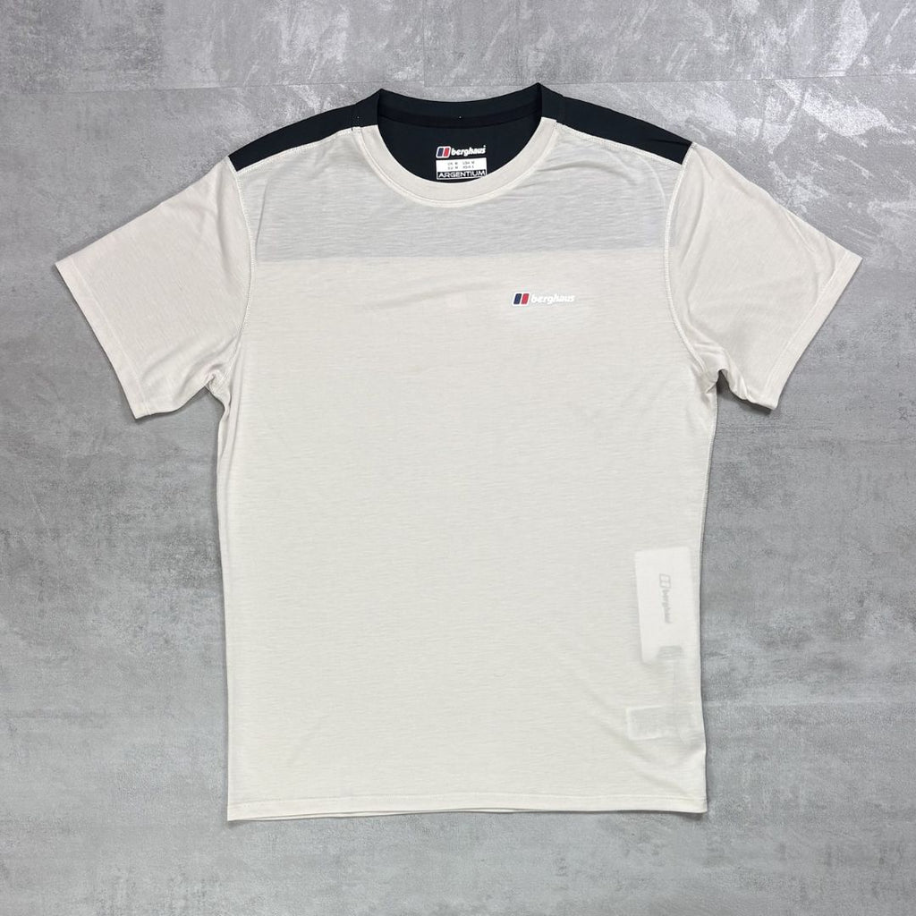 Berghaus White t-shirt with black sleeves on a grey surface