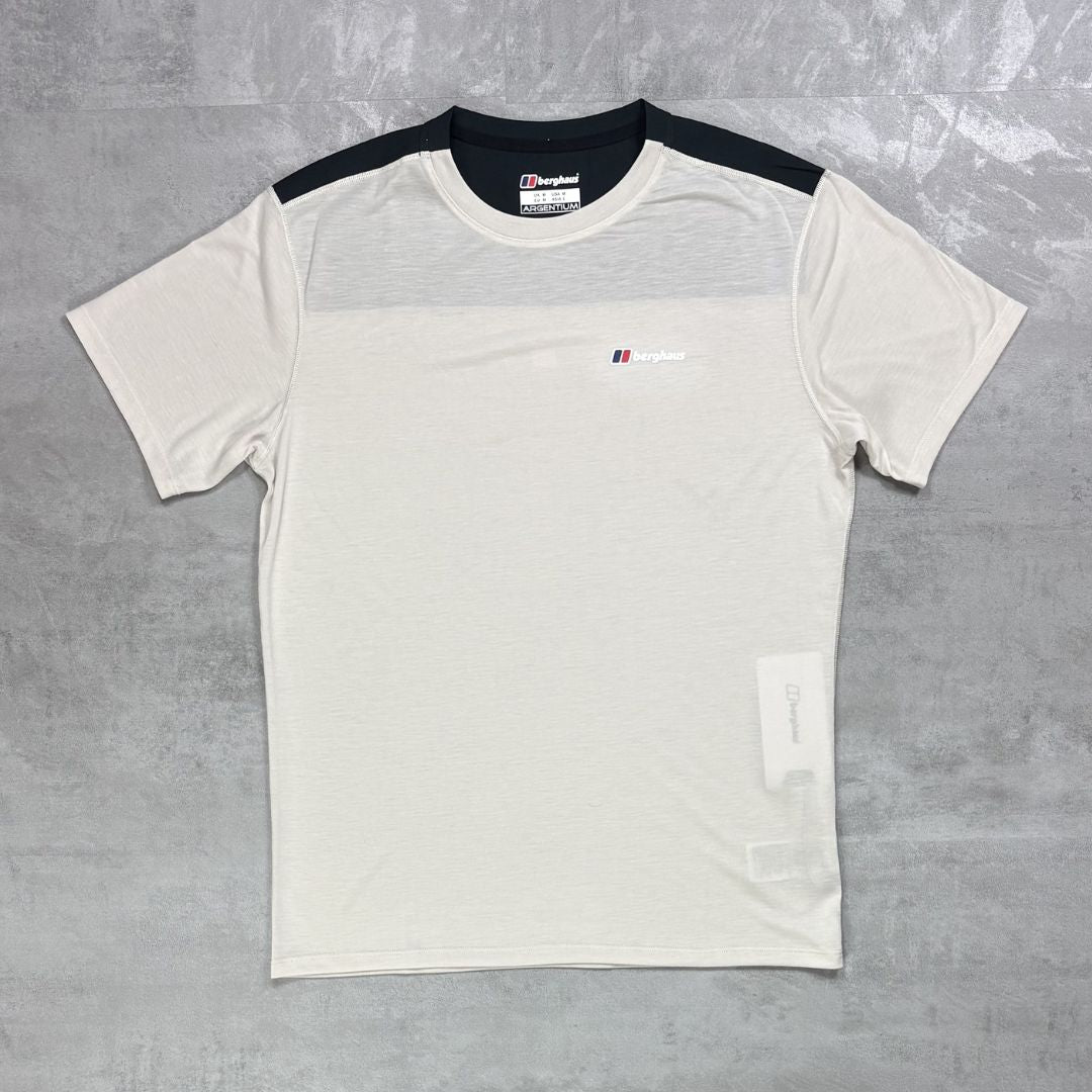 Berghaus White t-shirt with black sleeves on a grey surface