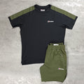A two-piece outdoor set from Berghaus, featuring a black short-sleeve t-shirt with olive green shoulder panels and matching olive green shorts, laid flat on a textured gray background.