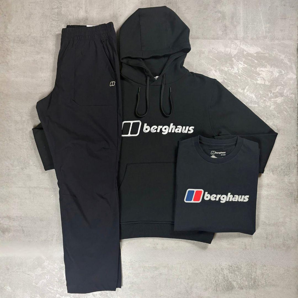 Berghaus Black Logo Hoodie, Tee & Pant Tracksuit for men, flat lay of black brushed fleece pullover hoodie with drawcord hood and Berghaus logo, black crewneck Berghaus logo t-shirt, and matching black joggers with elasticated waistband and patch pocket