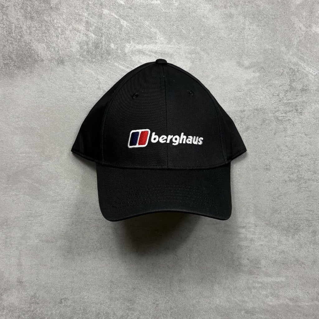 Black cap with Berghaus logo on a gray background