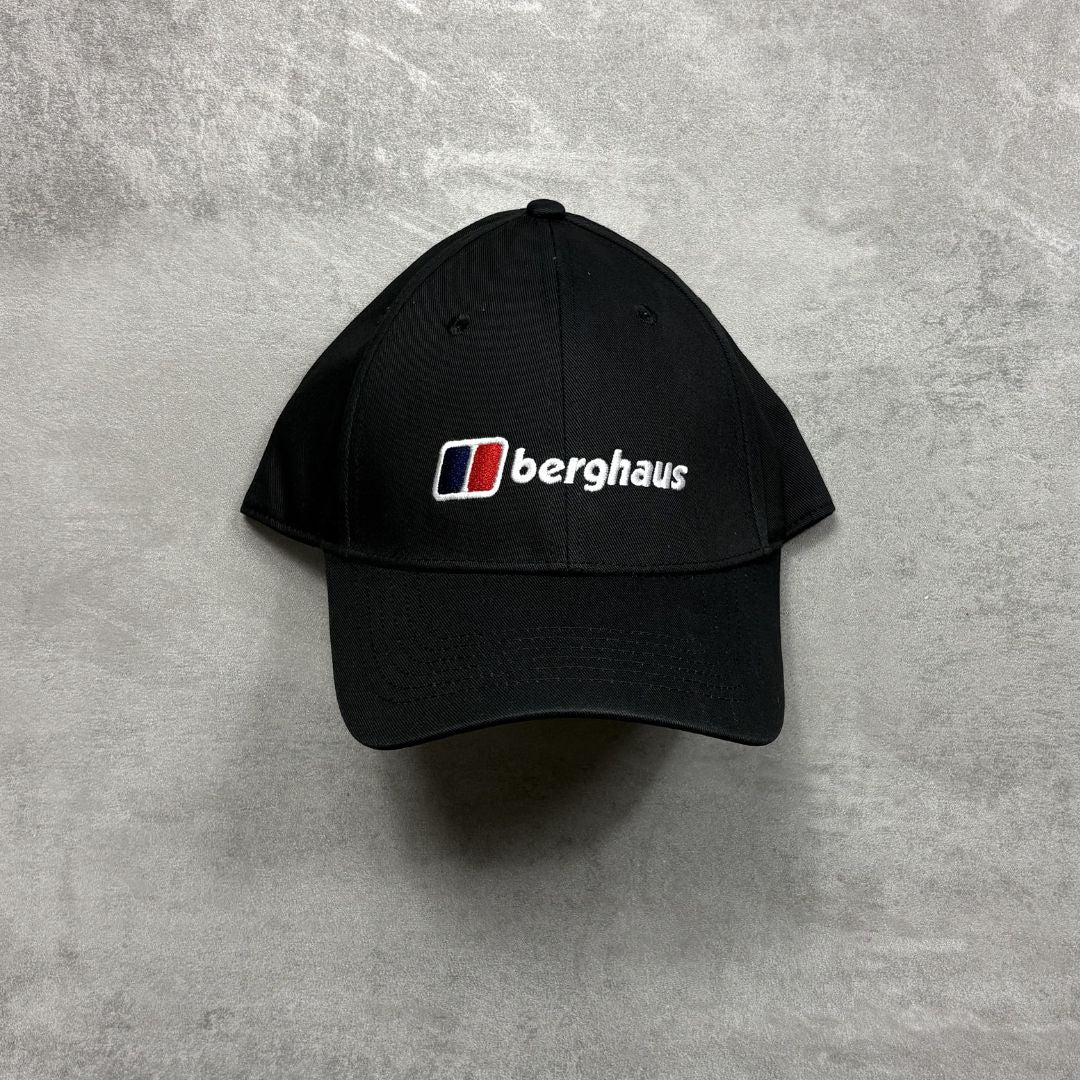 Black cap with Berghaus logo on a gray background