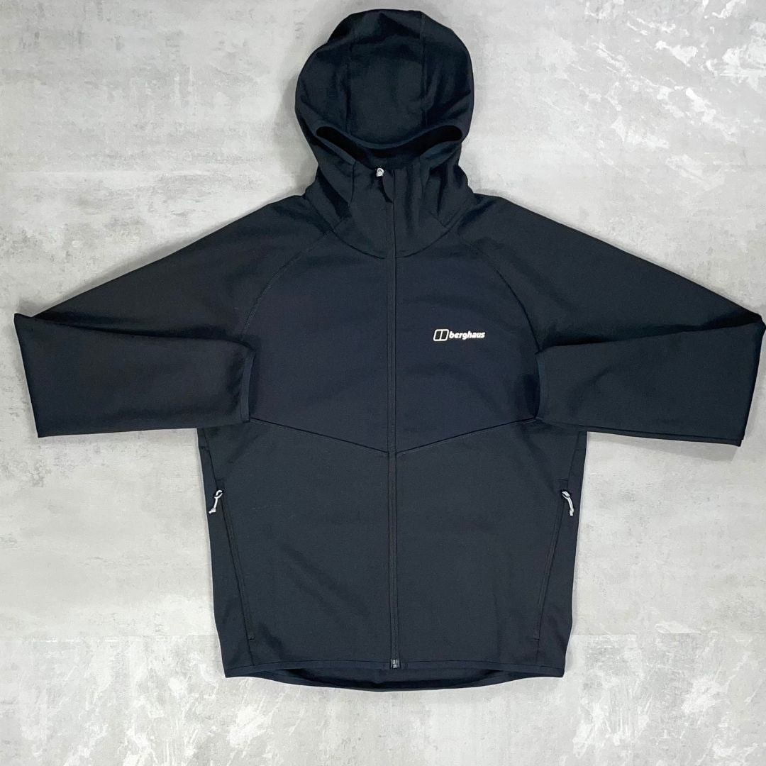 Black jacket with a Berghaus logo on a light gray background