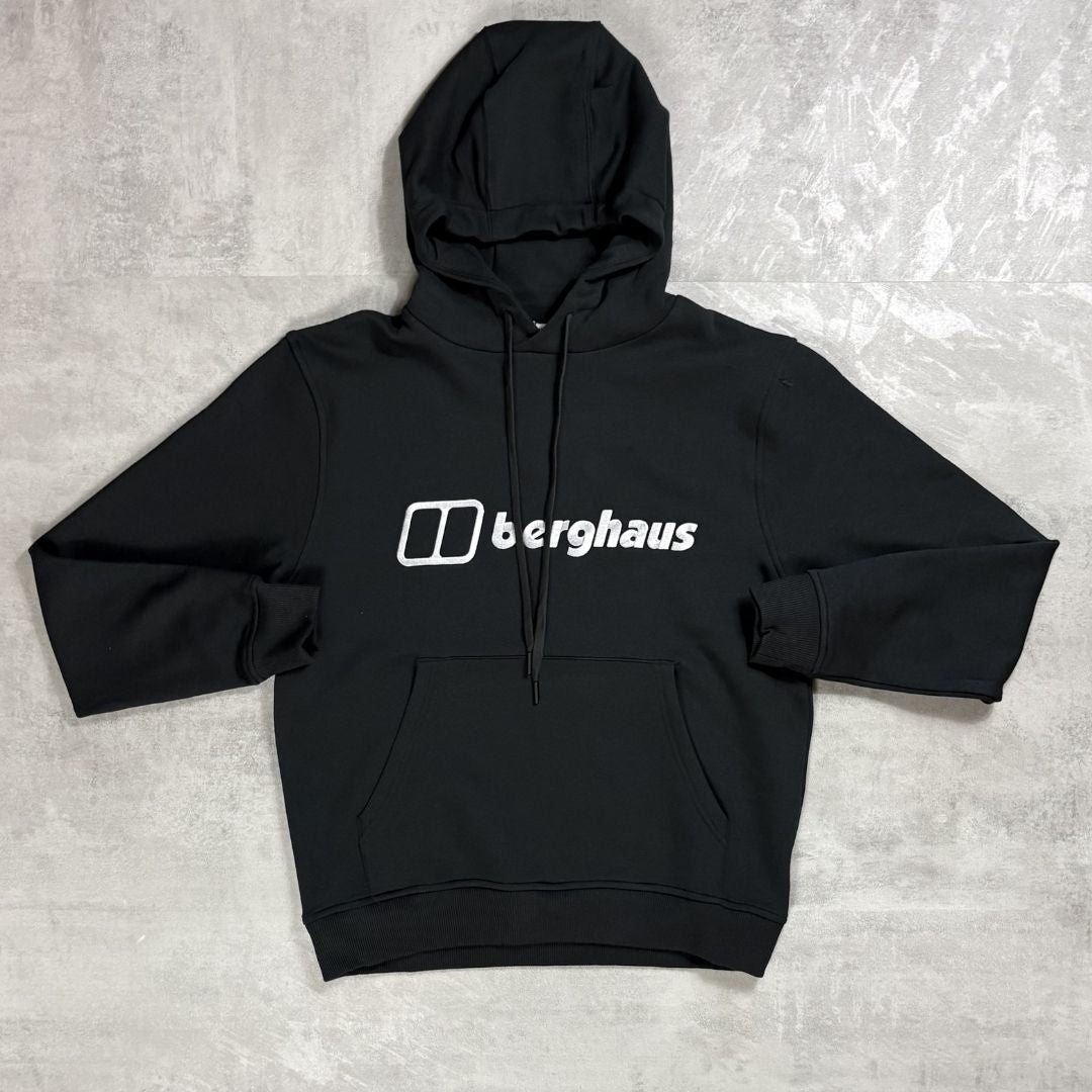 Black hoodie with Berghaus logo on a gray textured background