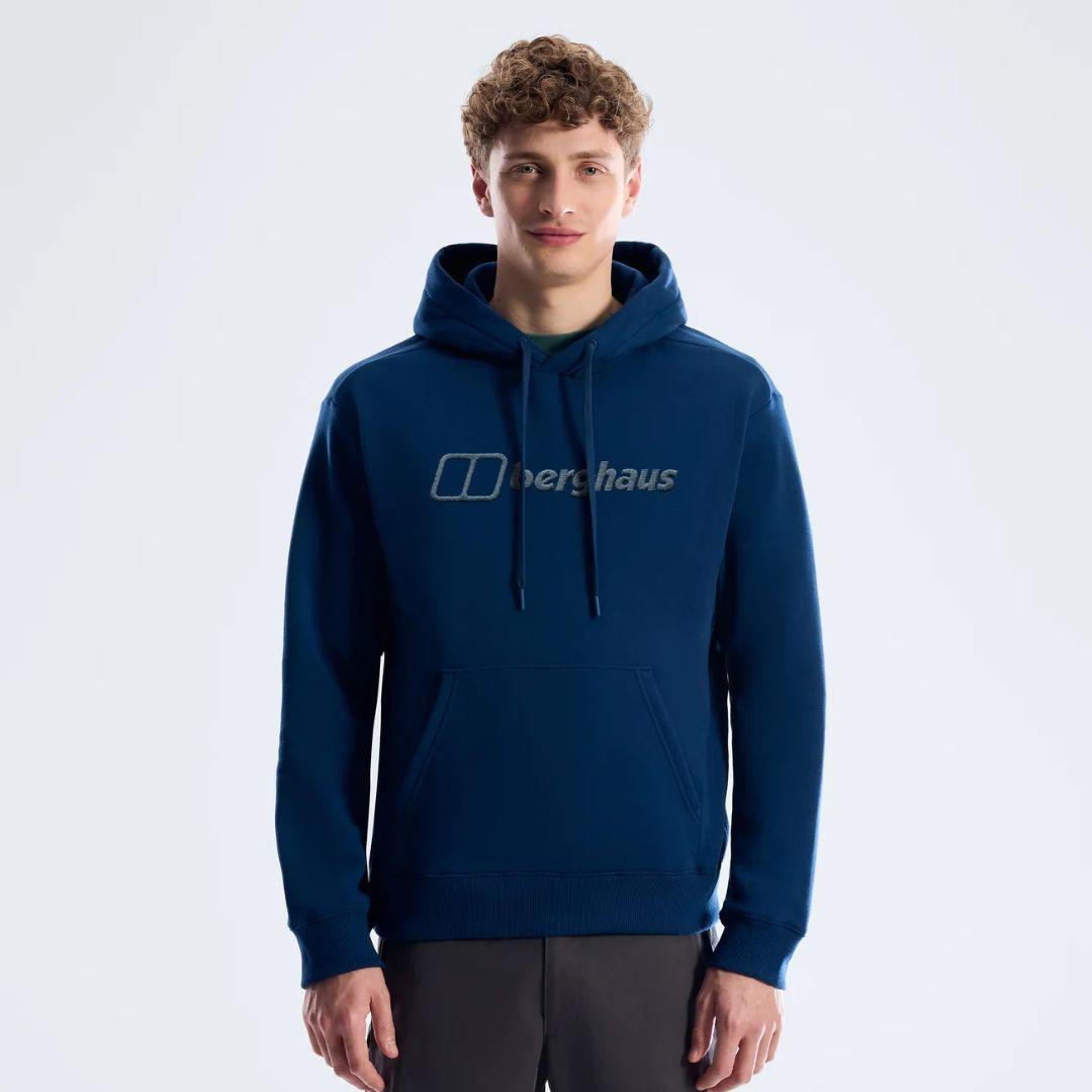 Berghaus 'Dark Blue' Logo Hoodie for men, front view on model of dark blue pullover hoodie with drawcord hood and large Berghaus logo across the chest
