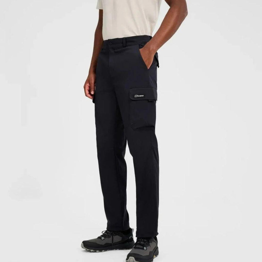 Berghaus Black Everyday Cargo Pant for men, front view on model of black relaxed-fit cargo trousers with hand in the front pocket and thigh cargo pocket, part of the 'Dark Blue' Logo Hoodie & Cargo Pant Tracksuit