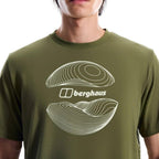 Berghaus 'Dark Green' Curvature Essential T-Shirt for men, close-up on model of the white contour-line graphic and Berghaus logo on the chest of the dark green tee