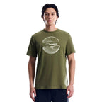 Berghaus 'Dark Green' Curvature Essential T-Shirt for men, front view on model of dark green crew neck tee with white contour-line graphic and Berghaus logo, part of the 'Dark Green' Deluge Pro 3.0 Jacket, Tee & Cargo Pant Tri-Set