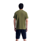 Berghaus 'Dark Green' Curvature Essential T-Shirt for men, back view on model showing the plain back of the dark green tee, part of the 'Dark Green' Deluge Pro 3.0 Jacket, Tee & Cargo Pant Tri-Set