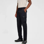Berghaus Black Everyday Cargo Pant for men, front view on model of black relaxed-fit cargo trousers with hand in the front pocket and thigh cargo pocket, part of the 'Dark Green' Deluge Pro 3.0 Jacket, Tee & Cargo Pant Tri-Set