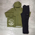 Berghaus 'Dark Green' Deluge Pro 3.0 Jacket, Tee & Cargo Pant Tri-Set for men, flat lay on a grey concrete surface of the dark green waterproof hooded jacket, dark green graphic tee and black cargo pant