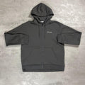 Berghaus 'Dark Grey' Logo Zip-Up Hoodie for men, flat lay on a grey concrete surface of the dark grey full-zip hoodie with hood, chest logo and front pockets
