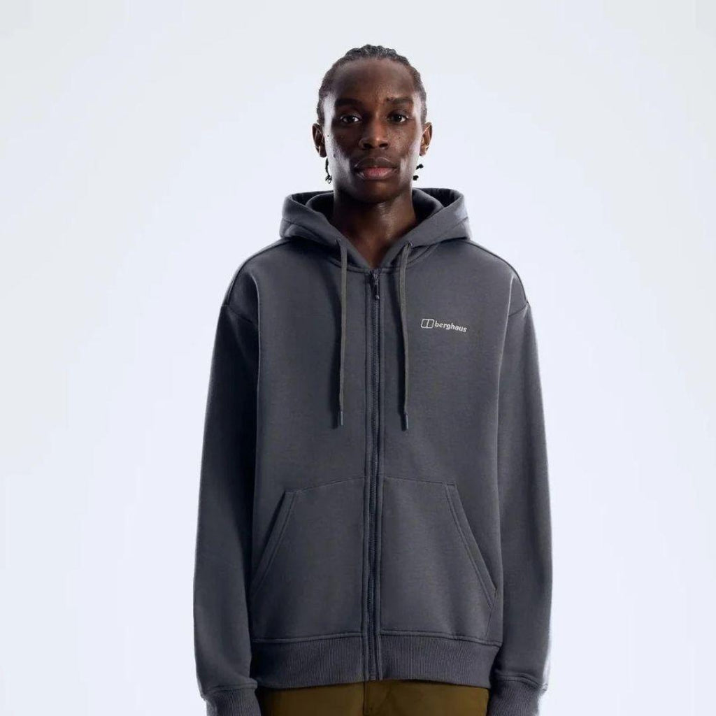 Berghaus 'Dark Grey' Logo Zip-Up Hoodie for men, front view on model of dark grey full-zip hoodie with drawcord hood, front pockets and small Berghaus logo on the chest, part of the 'Dark Grey' Logo Zip-Up Hoodie, Tee & Cargo Pant Tracksuit