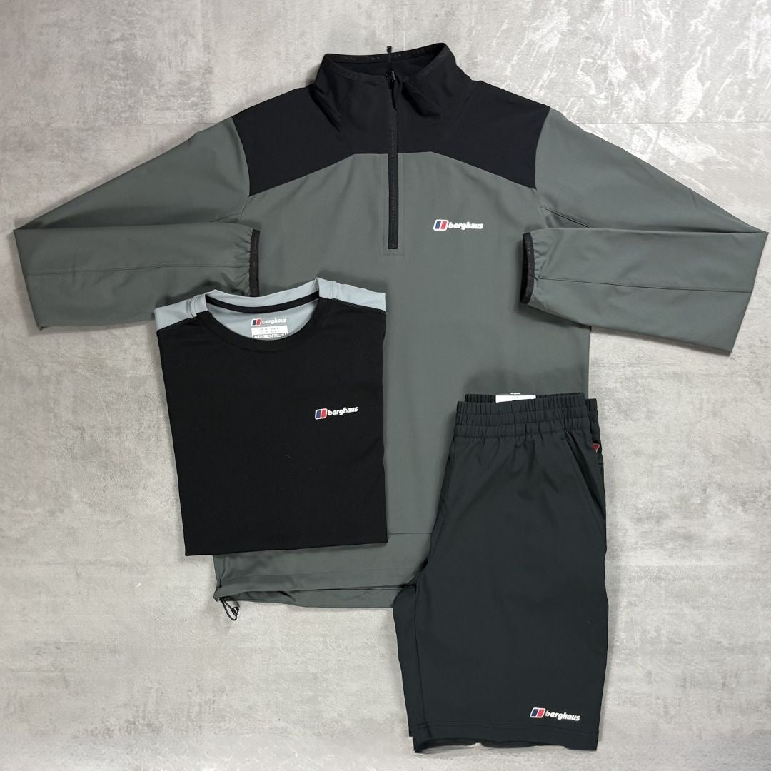 Gray and black tracksuit with Berghaus logo on a gray surface