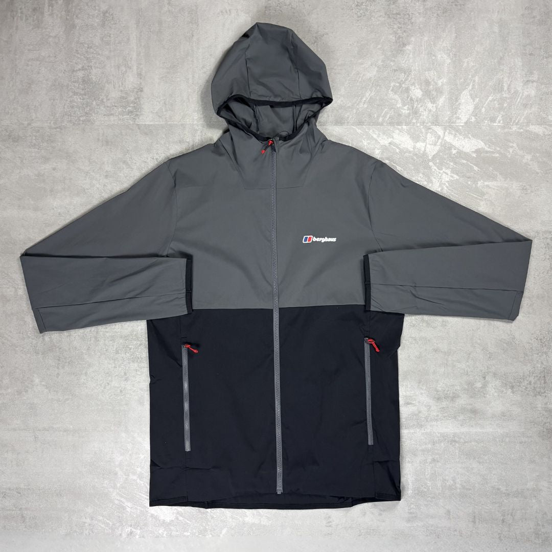 Gray and black jacket with a Berghaus logo on a gray background