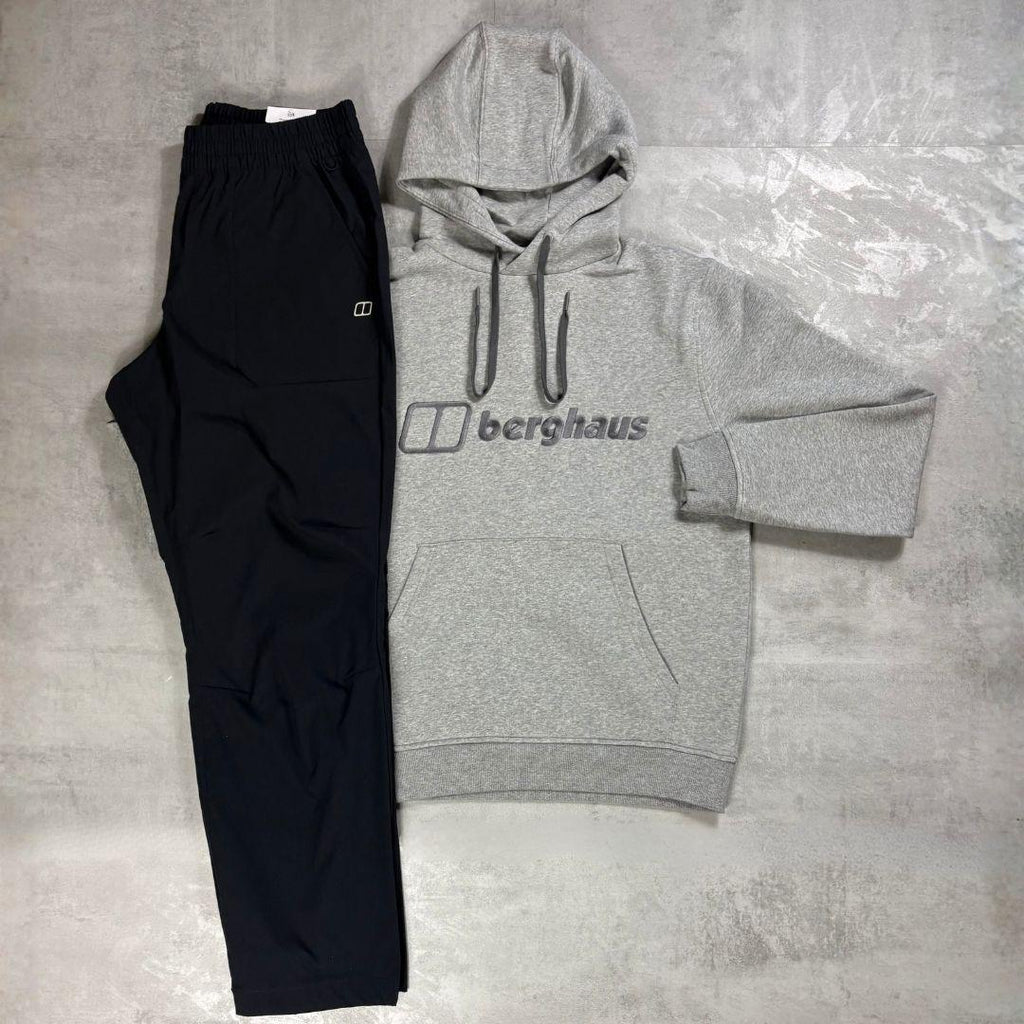 Berghaus Grey Logo Hoodie and Pant Tracksuit for men, flat lay of marl grey brushed fleece hoodie with Berghaus logo and matching black Explorer pant with adjustable waistband