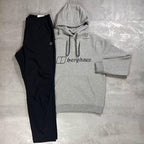 Berghaus Grey Logo Hoodie and Pant Tracksuit for men, flat lay of marl grey brushed fleece hoodie with Berghaus logo and matching black Explorer pant with adjustable waistband