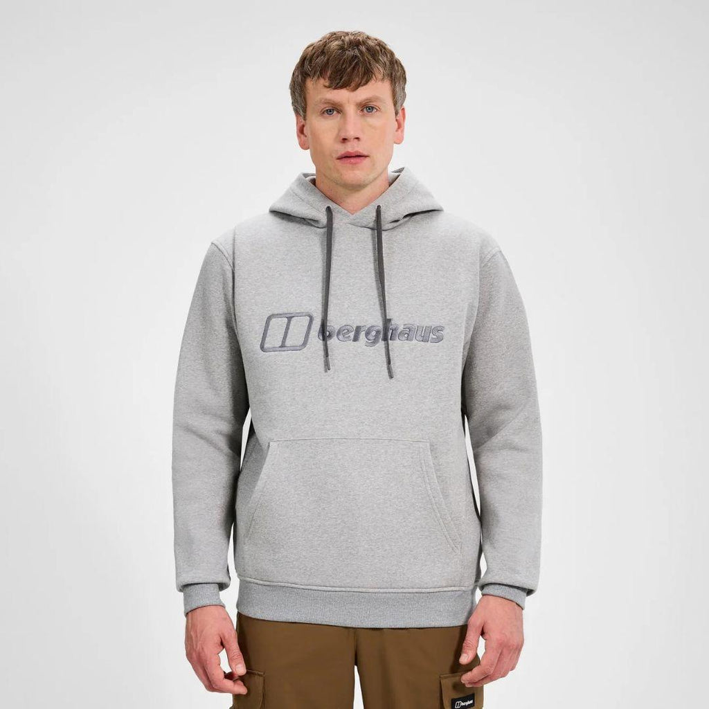Berghaus Grey Logo Hoodie for men, front view on model of marl grey pullover hoodie with drawcord hood and embroidered Berghaus logo, part of the Grey Logo Hoodie and Pant Tracksuit