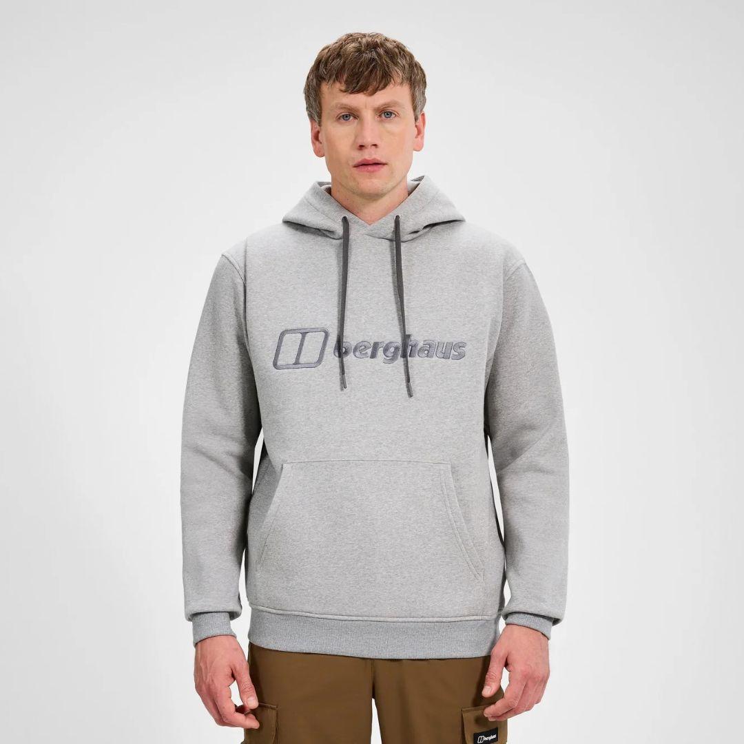 Berghaus Grey Logo Hoodie for men, front view on model of marl grey pullover hoodie with drawcord hood and embroidered Berghaus logo, part of the Grey Logo Hoodie and Pant Tracksuit
