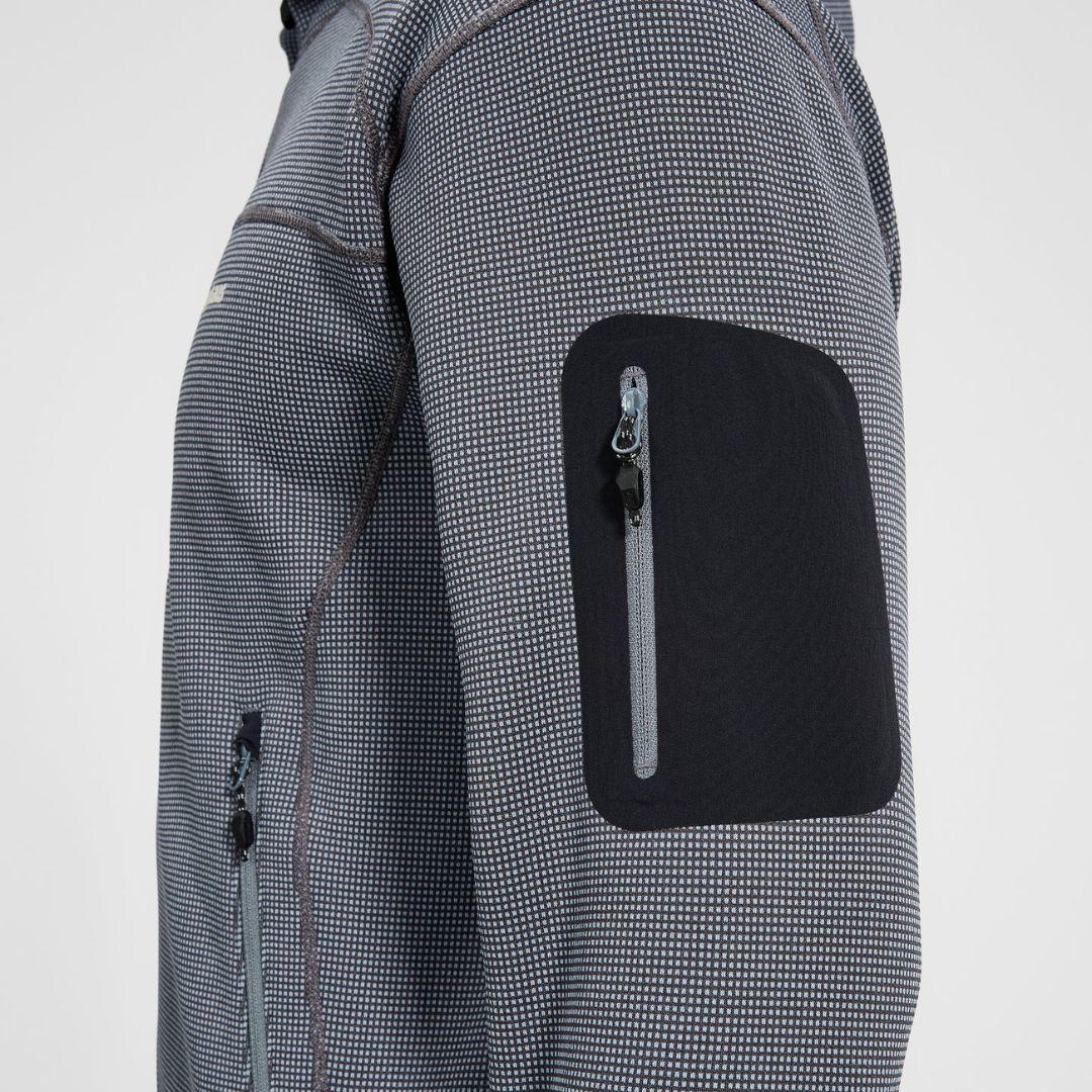 Berghaus Grey Pravitale MTN 2.0 Hooded Fleece Jacket for men, close-up of the zipped sleeve pocket on the textured grey stretch fleece