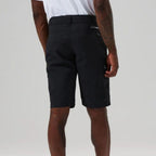 A man wearing black cargo shorts and a white t-shirt, shown from the back against a light gray studio background. The brand name 'Berghaus' is visible on a small white tag on the back pocket.