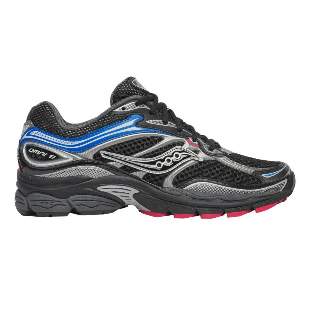 A Saucony Omni 9 running shoe in black, gray, and blue with a bright pink outsole accent, shown from a side profile view on a white background.