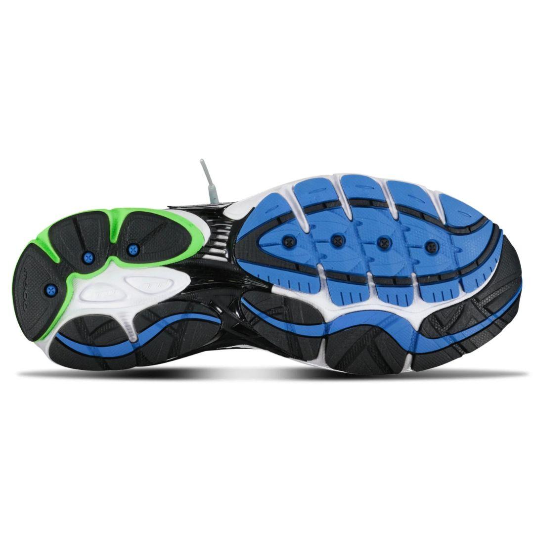 Close-up of a running shoe sole with black, blue, and green design on a white background