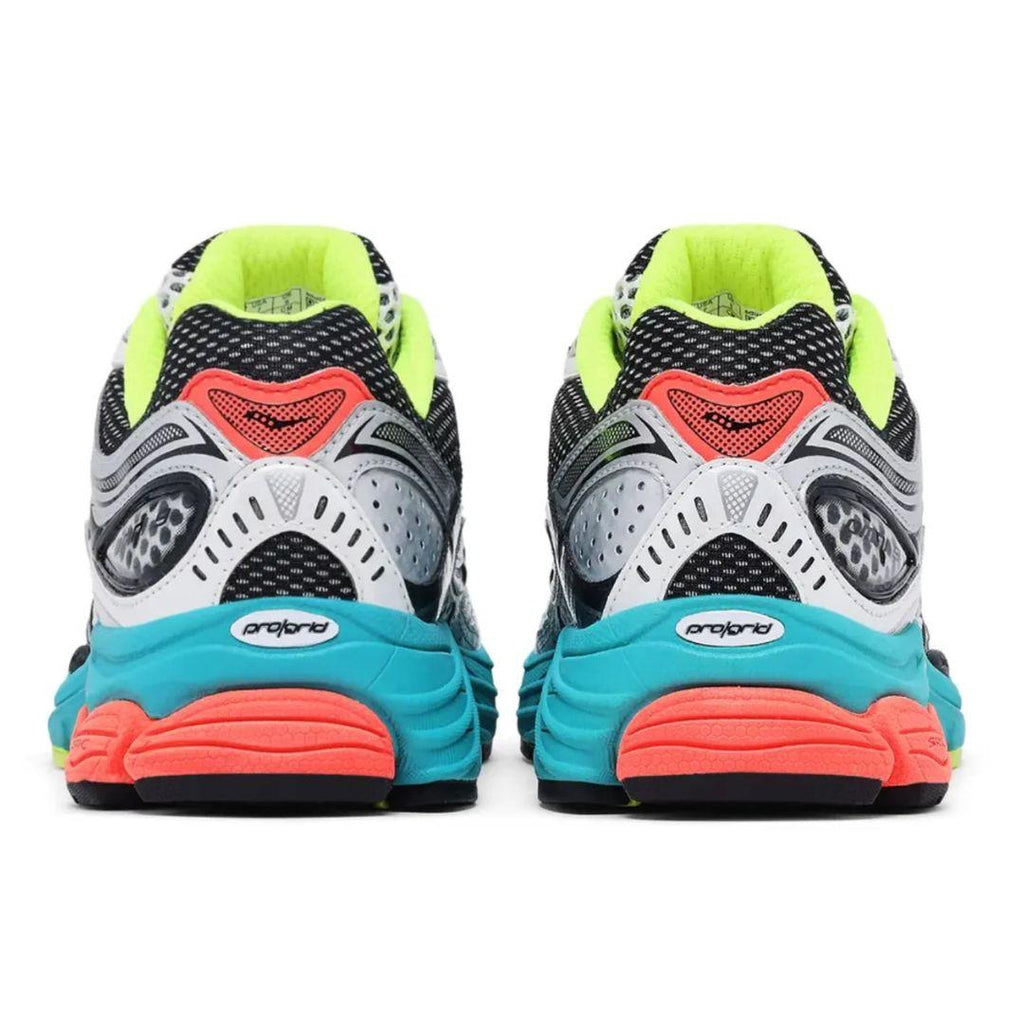 A pair of Ankle running shoes shown from the back, featuring a black mesh upper with gray and white overlays, a bright neon yellow-green collar, a coral pink accent, and a chunky turquoise and coral sole.