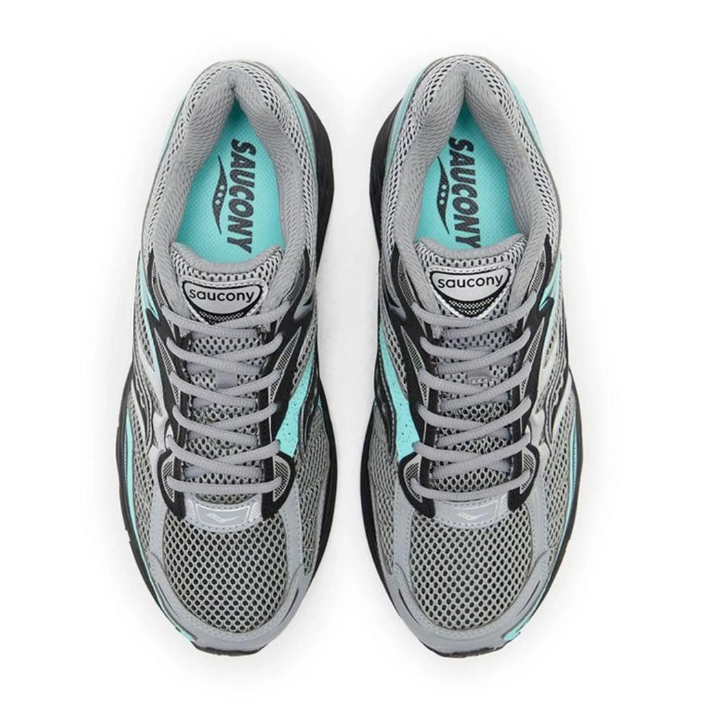 A pair of Saucony athletic sneakers shown from a top-down view on a plain white background. The shoes feature a gray mesh upper with black overlays, gray laces, and light blue accents on the inner lining and around the eyelets.